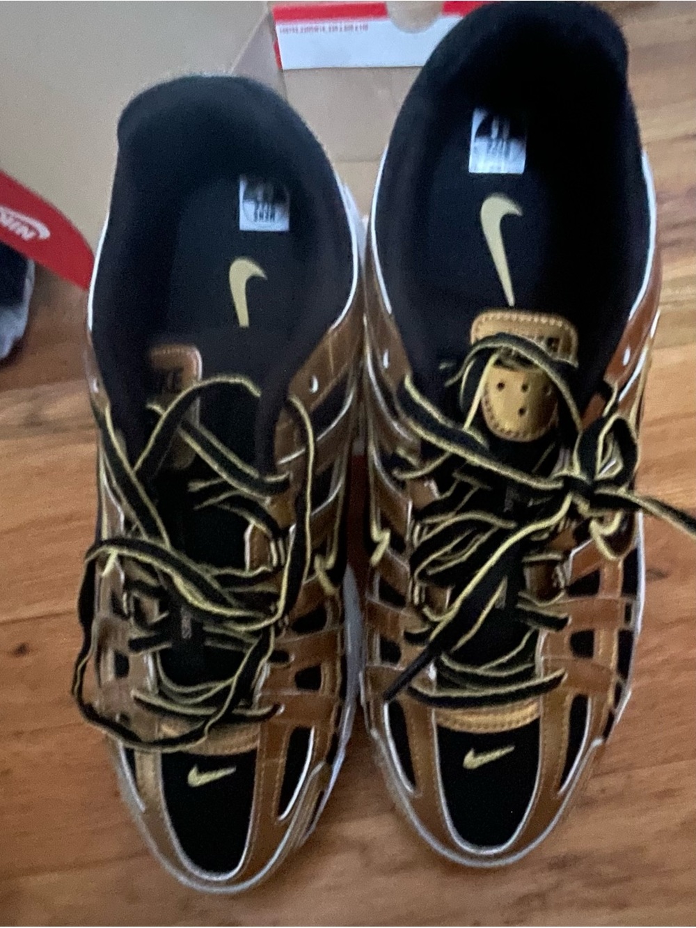 Nike Black and Gold Metallic Cage-Style Sneakers